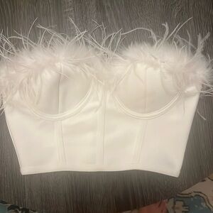 White bustier with feathers